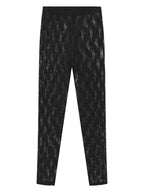 Transparente Spitzenleggings in Schwarz, elegante Damenmode, feines Spitzenmuster